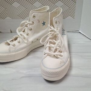 Converse White High-Tops with Blue Star